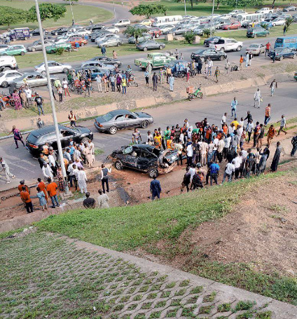 Cabman dies and two others injured after vehicle skidded off bridge in Abuja